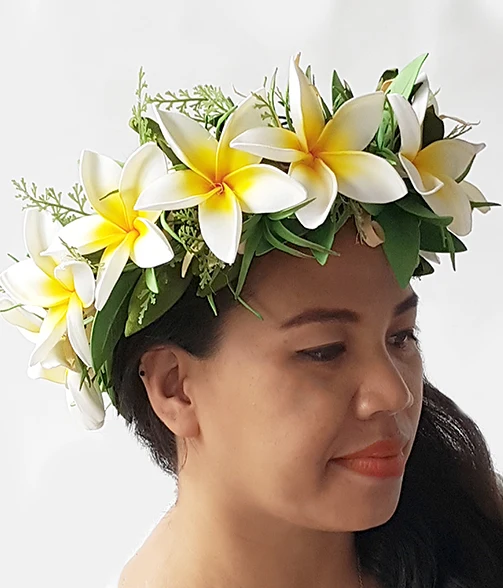 Handmade plumeria flower crown worn by a customer