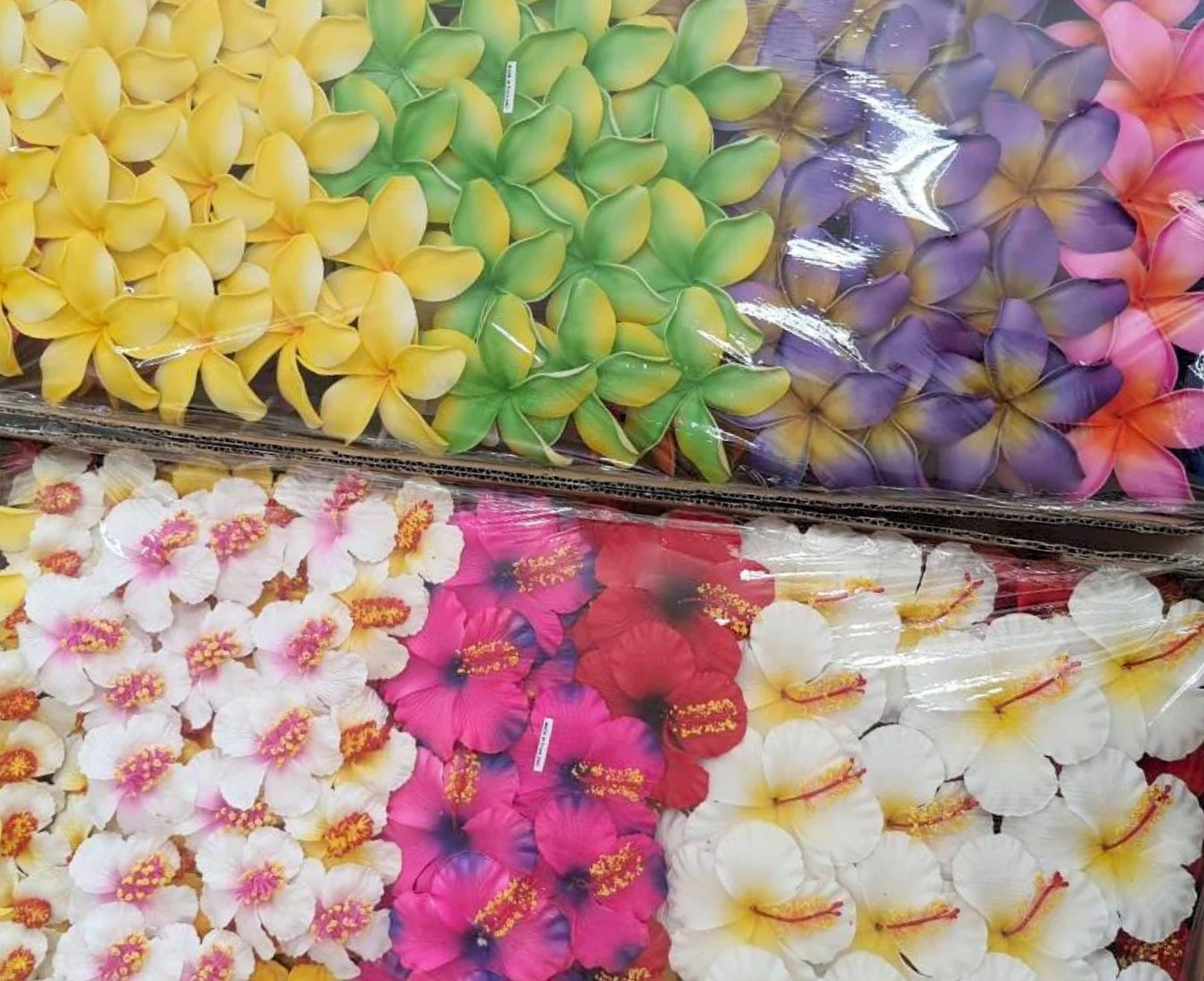 Handmade plumeria and hibiscus flowers ordered by a US customer